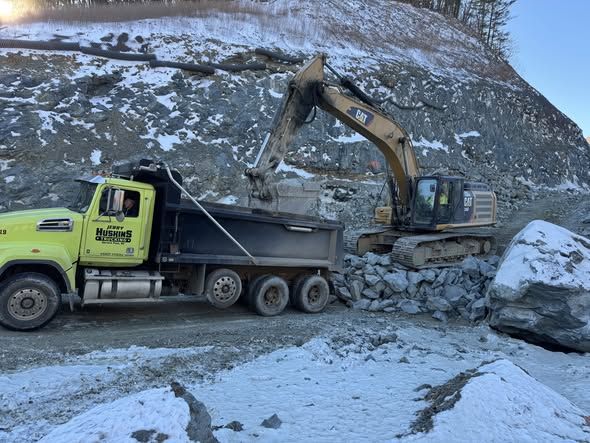 Crews work in cold temperatures, 20 degrees, this morning on the NC 105 Project in Boone, NC.