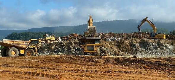 When there’s this much dirt and rock to move, sometimes you just have to bring out the big guys.