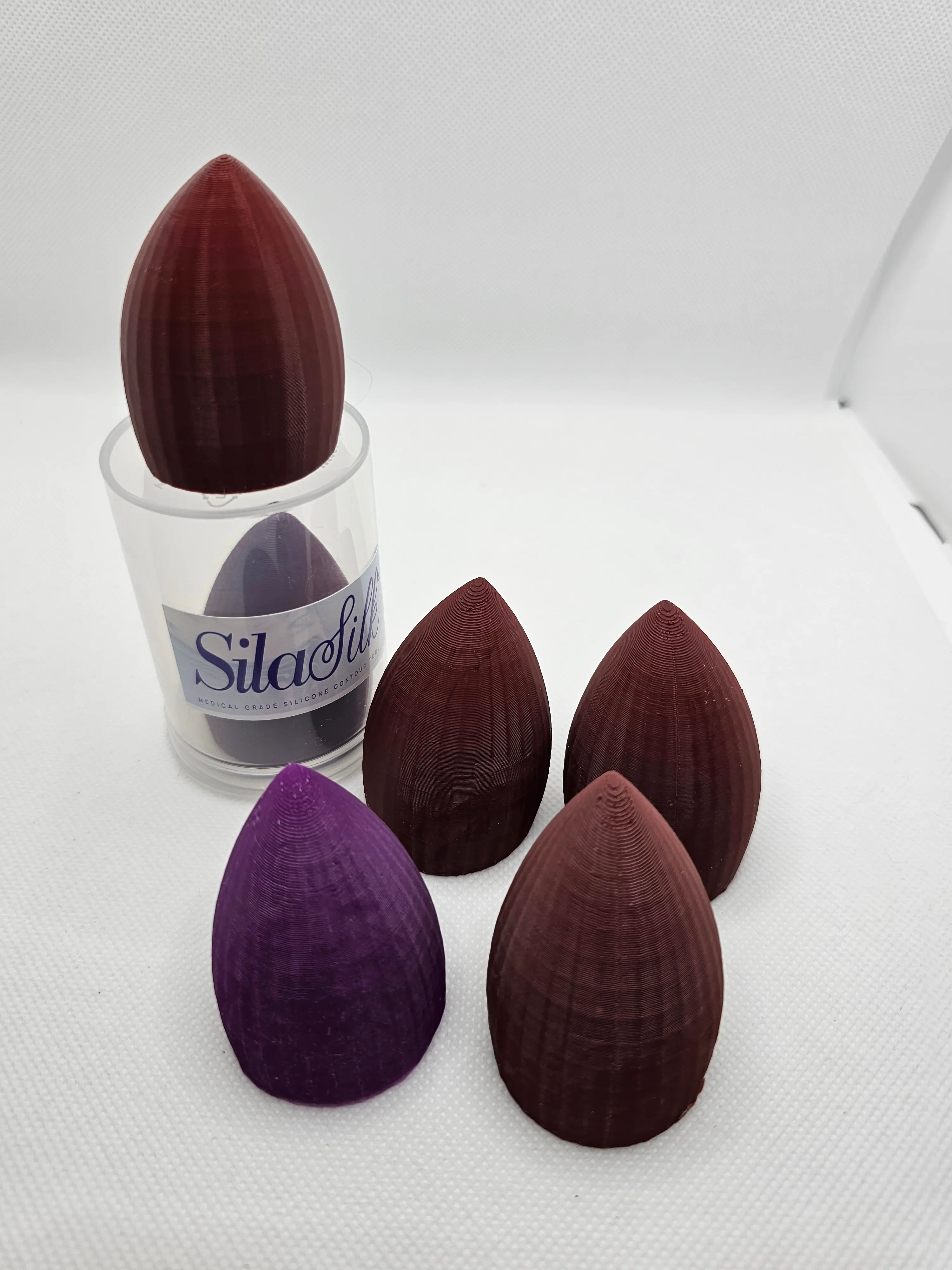 A group of SilaSilk applicators in various sizes and colors
